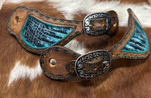 Hand tooled and painted spur straps