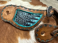 Hand tooled and painted spur straps