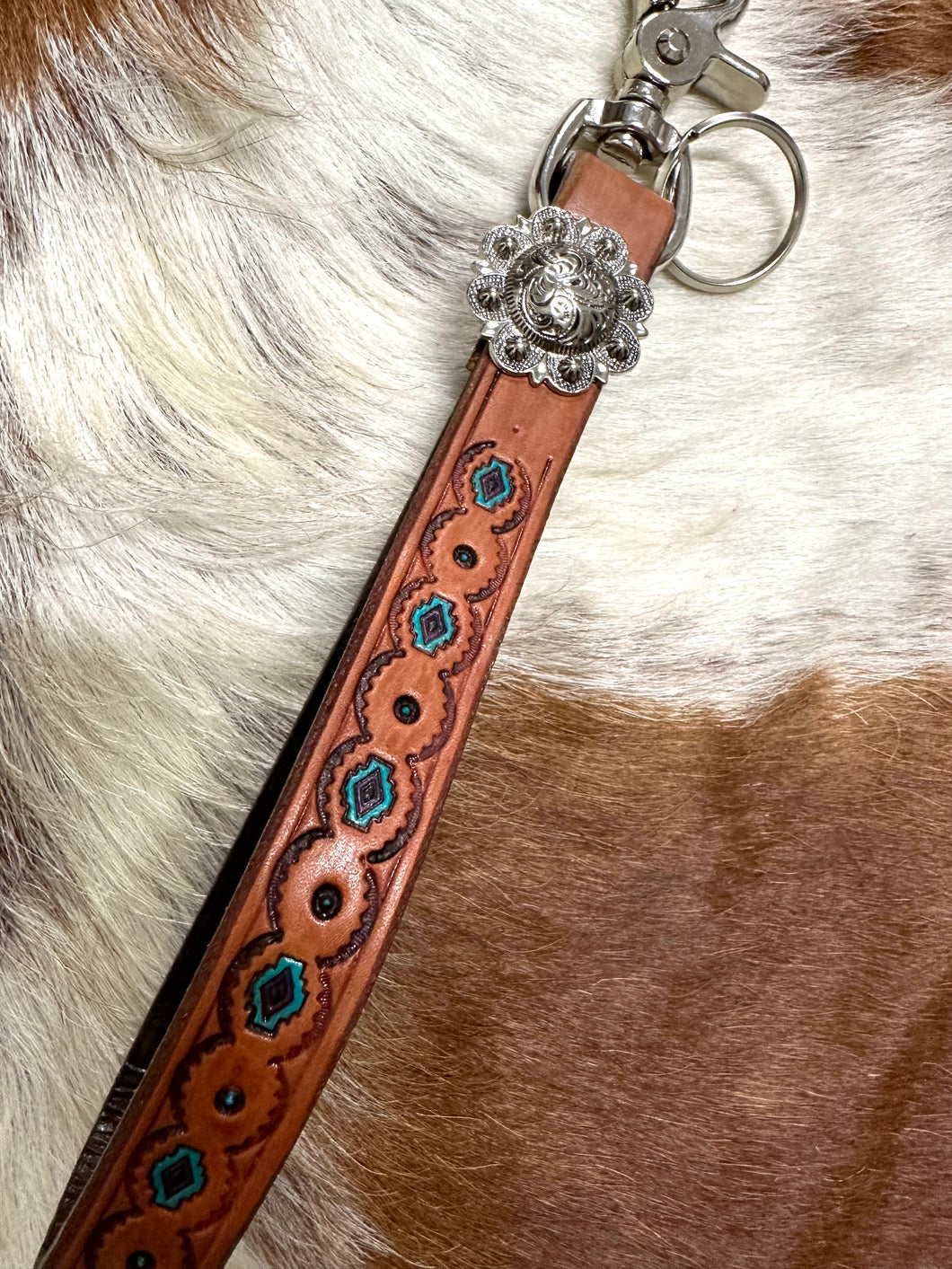 hand tooled and painted key chain wristlet