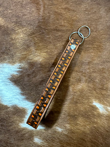hand tooled and painted key chain wristlet