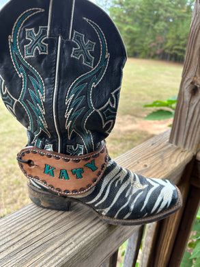 Hand tooled and painted spur straps