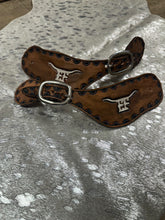 Custom Brand Hand tooled and painted  spur straps.