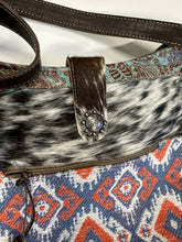 Cowhide, Tapestry and leather shoulder bag with leather strap