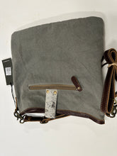 Cowhide, Tapestry and leather cross body  bag with leather strap